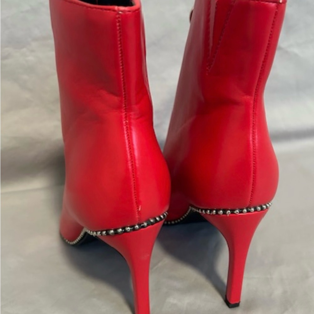 Red ankle boots, never worn, size 6.5.